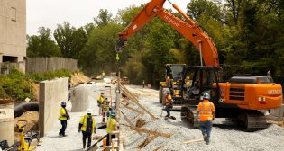 A design-build contractor team has been selected for the long-delayed Purple Line light rail project in Maryland. Construction is set to begin this spring, with service commencing in fall 2026. (Pictured: Purple Line construction work in Bethesda.)