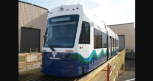 Pictured: The first of five Liberty® LRVs prepares for departure from Brookville’s manufacturing facility in western Pennsylvania prior to its March 2022 shipment date.