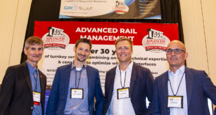 GRT announced its acquisition of ARM at Wheel/Rail Interaction Conference 2022 in Vancouver. Pictured (left to right): Gordon Bachinsky, President, ARM; Andreas Oberhauser, GRT; Mark Reimer, ARM; Harald Eller, CEO, GRT. (Photograph Courtesy of GRT/ARM)