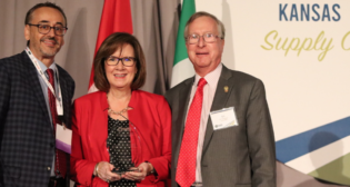 At the NARS annual meeting last month, SWARS Co-Executive Director Susan Cox received the 2022 Edward R. Hamberger Lifetime Achievement Award. She is pictured with NARS Board President Bruce C. Mann (left) and Edward R. Hamberger, former President and CEO of the Association of American Railroads. (Photograph Courtesy of NARS)