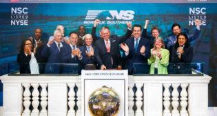 Norfolk Southern Corporation (NYSE: NSC) team members ring The NYSE Opening Bell®. (Caption and Photograph Courtesy of NYSE)
