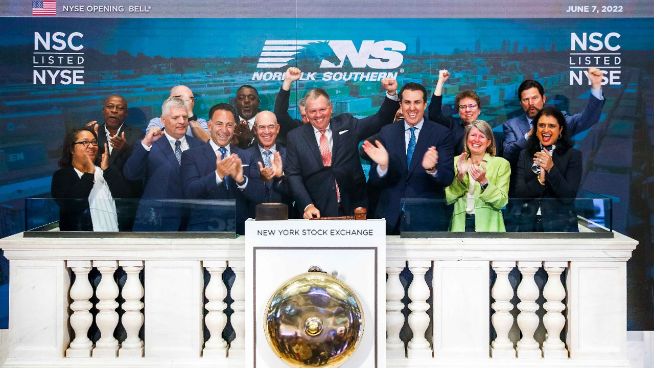 Norfolk Southern Corporation (NYSE: NSC) team members ring The NYSE Opening Bell®. (Caption and Photograph Courtesy of NYSE)
