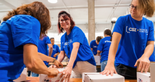 CSX and subsidiary Quality Carriers employees recently assembled 5,000 care packages for U.S. troops stationed in Eastern Europe, who have been mobilized in response to the conflict in Ukraine. (Photograph Courtesy of CSX)