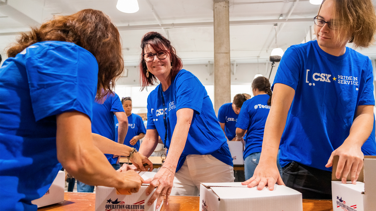 CSX and subsidiary Quality Carriers employees recently assembled 5,000 care packages for U.S. troops stationed in Eastern Europe, who have been mobilized in response to the conflict in Ukraine. (Photograph Courtesy of CSX)