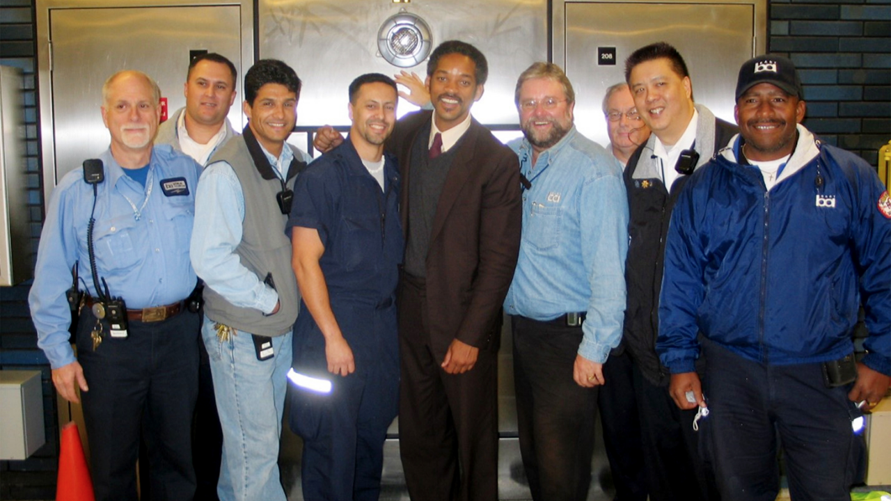 Actor Will Smith with BART employees on-set of “The Pursuit of Happyness” in 2005. (Caption and Photograph Courtesy of BART)