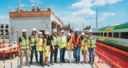 Brightline and contractor Kaufman Lynn on Aug. 16 hosted a “topping off” ceremony for the passenger rail system’s Boca Raton station and parking garage, signifying completion of structural work. (Photograph Courtesy of Brightline)