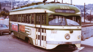 This photo taken in the mid 1970s shows the “green and cream wings” livery once worn by hundreds of Muni vehicles. This car was delivered to Muni in 1948 and still operates today. (Caption and Photograph Courtesy of Muni)