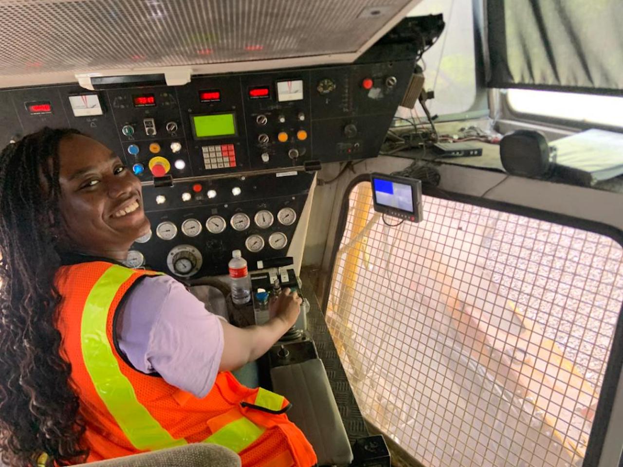During a trip to Fort Worth, summer intern Mariam Okunubi had a chance to see what it's like behind the controls of a ballast undercutter.