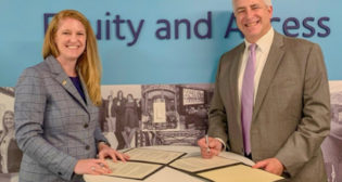 WTS International President and CEO Sara M. Stickler (left) and Eno President and CEO Robert Puentes (right) sign a formal MOU on Sept. 8.