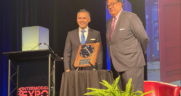 IANA Chairman Dr. Noel Hacegaba (left) on Sept. 12 presented the association’s 2022 Silver Kingpin Award to Tiger Cool Express Chief Strategy Officer and Co-founder Ted Prince. (Photograph Courtesy of IANA)