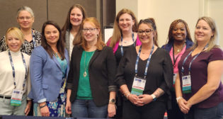 LRW President Sarah Yurasko (fourth from right) is joined by LRW leaders at the 2022 Annual Conference in Ft. Worth, Tex. (Photograph and Caption Courtesy of LRW)