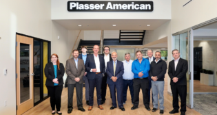 Pictured during the Oct. 31 contract signing were Plasser American President and CEO Thomas Blechinger (fourth from left) and DPR Co-founder, President and CEO Dominick Pagano (center) with company executives. (Plasser American Photograph)