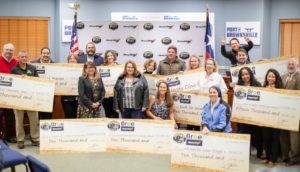 Representatives from OmniTRAX and The Brownsville & Rio Grande International Railway host the local nonprofit recipients of their annual community outreach program. $100,000 in donations were distributed to eleven local nonprofits throughout the Brownsville community.