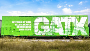 “GATX is sending us a boxcar that’s green—literally. The car will be in use across our network. Keep an eye out and maybe you’ll spot it!” BNSF wrote via LinkedIn earlier this month. (Photograph Courtesy of GATX via LinkedIn)
