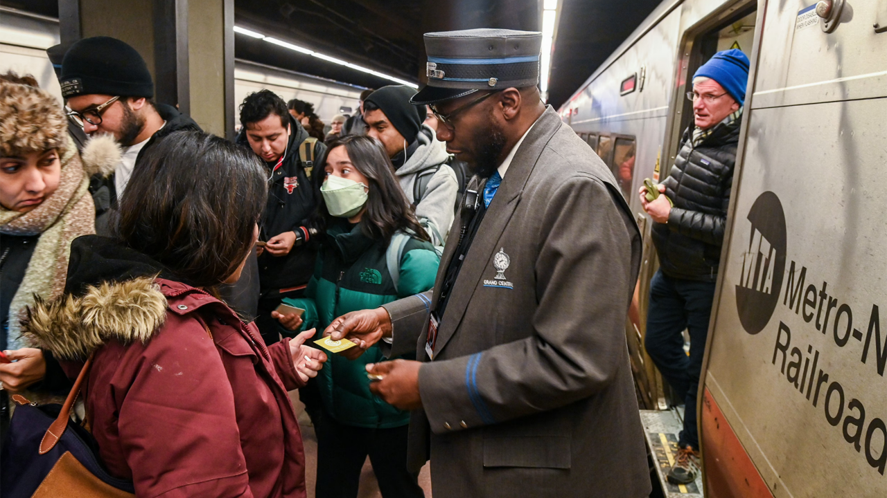 At 1:19 p.m. on Feb. 2, Grand Central Terminal’s 110th anniversary train—a local Metro-North Railroad train from Stamford, Conn., to Grand Central—arrived on Track 27. MTA officials greeted passengers and distributed commemorative stickers. (Marc A. Hermann / MTA)