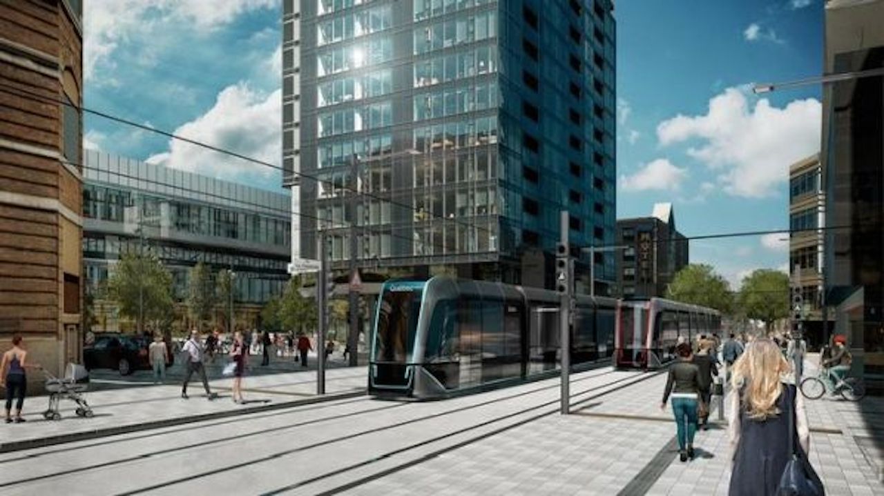 An artist's impression of LRVs on the light rail line through a busy street in Quebec City. Photo Credit: Ville de Quebec