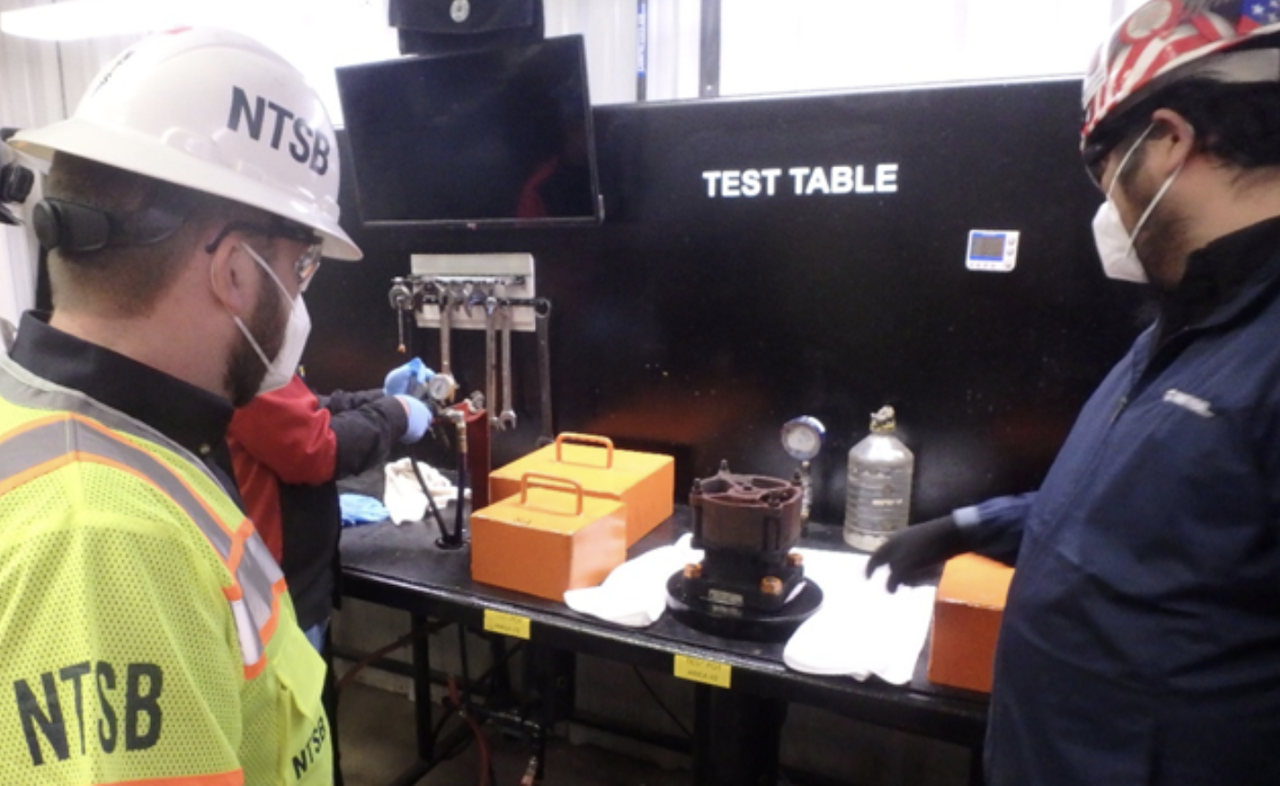 NTSB investigators on March 15 conducted a start-to-discharge pressure test on a pressure relief valve. (NTSB Source) ​