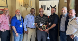Officials from the CSX TDSI terminal (New Boston, Mich.) were recently presented an award for the Highest Quality Review Score at the Association of American Railroads’ Damage Prevention and Freight Claims Conference. (CSX Photograph)