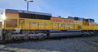The new locomotive is outfitted with emblems highlighting five of the railroad's employee-focused programs.