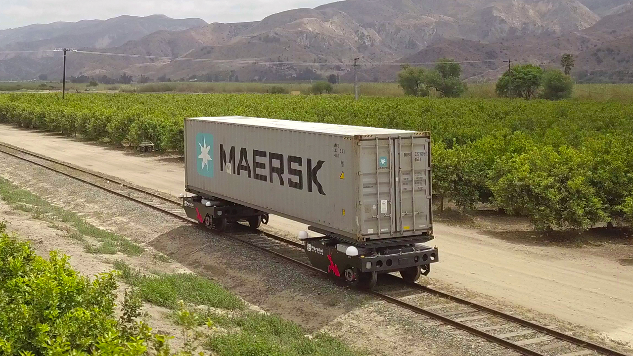 Pictured: Parallel’s prototype railcar loaded with a shipping container. (Photo courtesy of Parallel Systems)