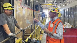UP Chairman Lance Fritz, right, speaks with UP Machinist Marco Melendez during a recent field visit to the Proviso Diesel Facility in Illinois. (Caption and Photograph Courtesy of UP)