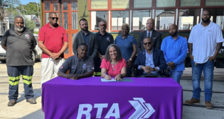 “Today, we announced our new four-year agreement with the local chapter of the International Brotherhood of Electrical Workers (IBEW) at the Carrollton Streetcar Barn,” RTA reported in a Sept. 7 Facebook post. “We are excited to continue to partner with our skilled workforce who maintain our buildings and fleet, which allows the RTA to deliver world class transit!” (RTA Photograph)
