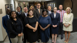​​NTSB Chair Jennifer Homendy (right) with some of the 15 new employees sworn in on Sept. 25. The agency now has 433 staffers. (Caption and Photograph Courtesy of NTSB)
