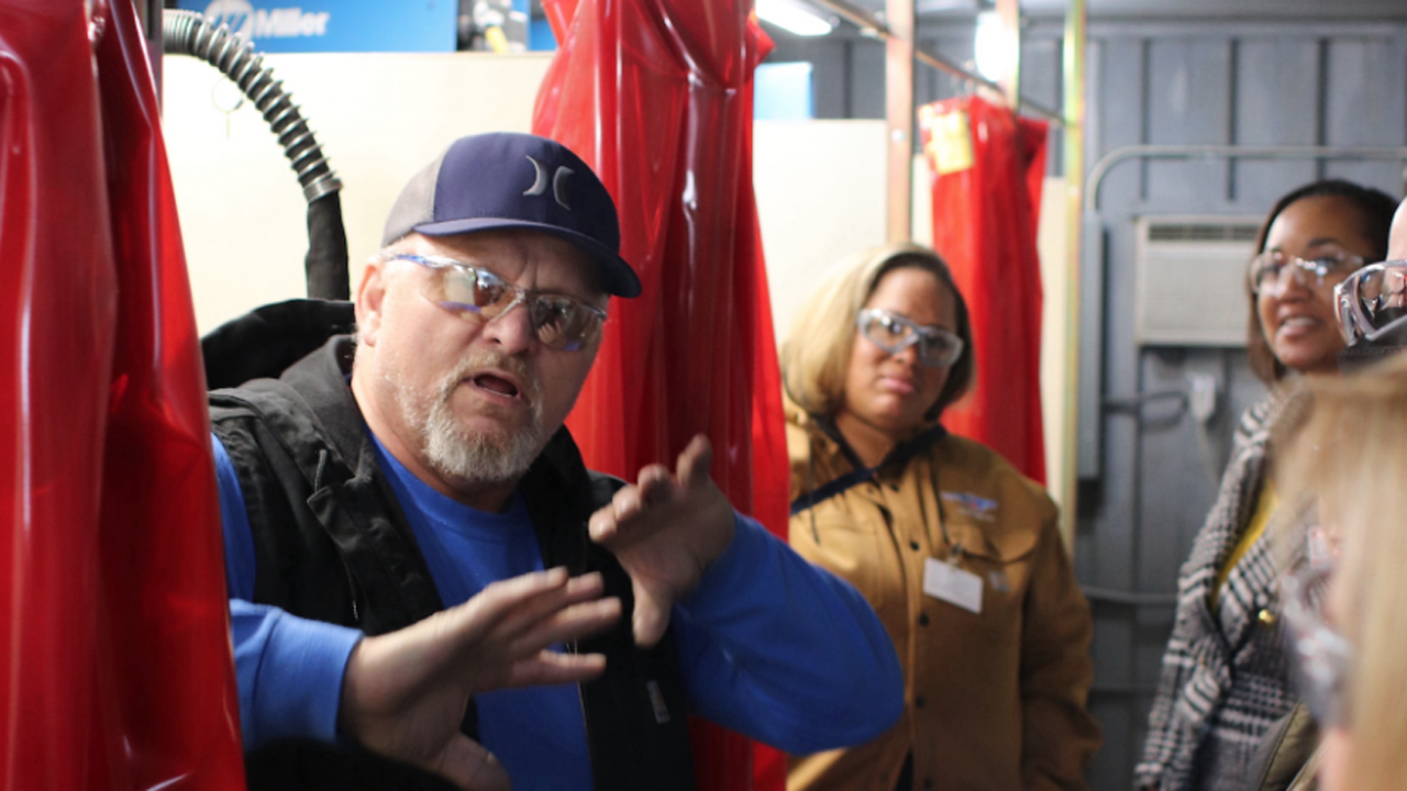 PCC Welding instructor Todd Barnett on Nov. 10, 2022, discussed the amenities of the mobile training center with Union Pacific. (Caption and Photograph Courtesy of PCC)