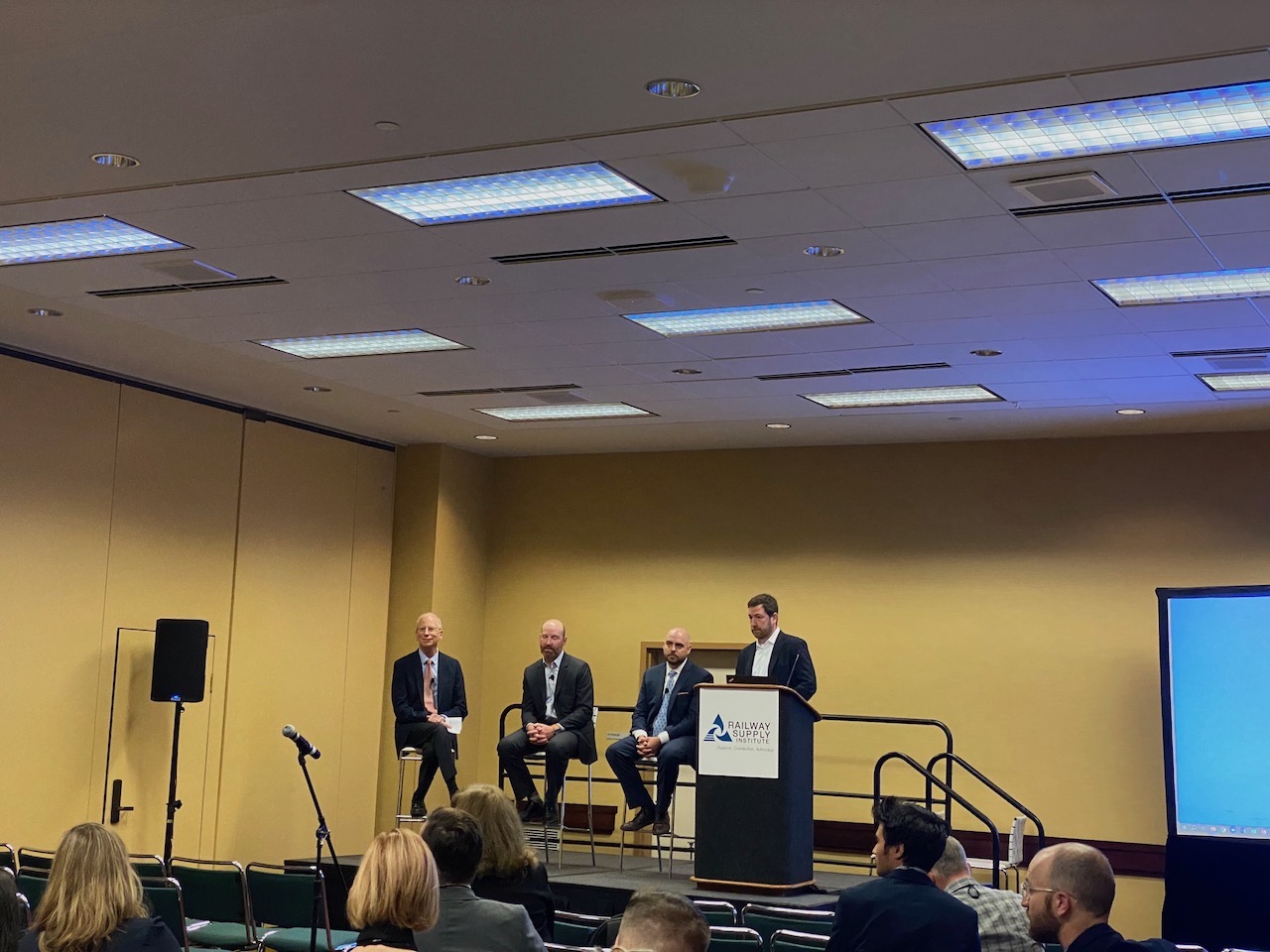 From Left to Right: David Carol, CEO, APTA; Greg Regan, TTD, AFL/CIO; Harrison M. Wadsworth, Vice President, Government Relations, AECOM; and Mike Friedberg, Partner, Holland & Knight.