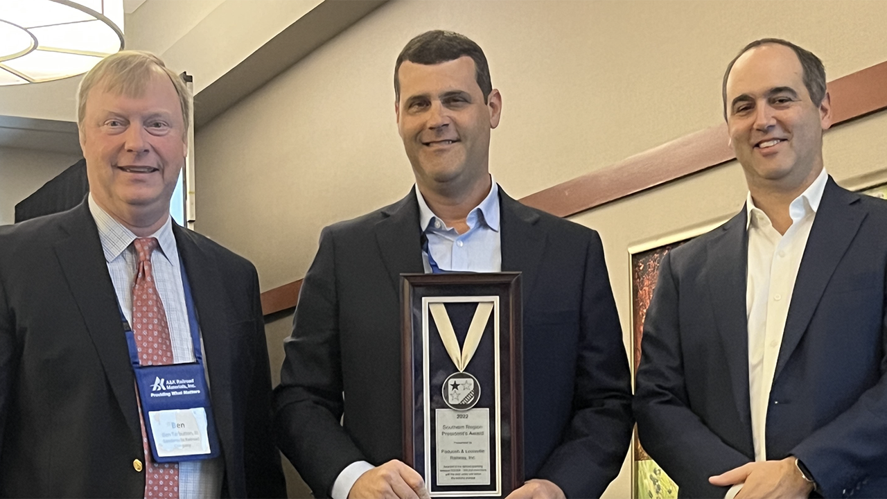Paducah & Louisville Railway, Inc. was one of five ASLRRA Southern Region members to earn a President’s Award in 2023. ASLRRA President Chuck Baker (right) and ASLRRA Southern Region Vice President Ben Tarbutton III (left) presented the award at this month’s Eastern & Southern Region Meeting. (ASLRRA Photograph)