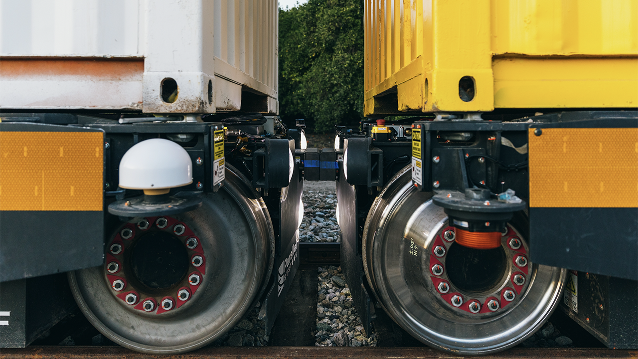 According to Parallel Systems, its autonomous battery-electric freight cars “form platoons through bumper-to-bumper contact.” Traditional coupling is not required, allowing “freight to [be] sort[ed] on the rail network,” it reports. (Parallel Systems Photograph)