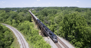 “With the increase in train size, our [grain] customers will now have to plan and coordinate their operations around fewer trains,” said Ed Elkins, NS Chief Marketing Officer. “This creates new opportunities to explore ways we can leverage the capacity this frees up for both the customer and Norfolk Southern.” (NS Photograph)