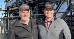 Tim Worrell, right, with his father, Ken Worrell, locomotive engineer. (Photograph Courtesy of BNSF)