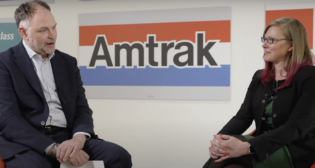 Amtrak CEO Stephen Gardner (left) and Laura Mason, Amtrak Executive Vice President of Capital Delivery. (Screen Shot of Amtrak Video)